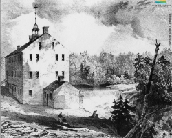 La première fabrique de tissus de laine de Sherbrooke, vers 1836. Ouverte par le marchand Charles Goodhue en 1827, entièrement mécanisée, elle est vendue à la <em>British American Land Company</em> en 1834, et ferme ses portes en 1837.